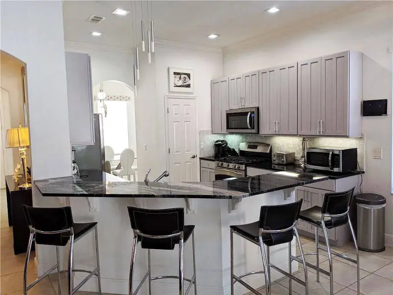 Reunion Resort Orlando king bedroom Reunion Resort Orlando kitchen 4 bed villa