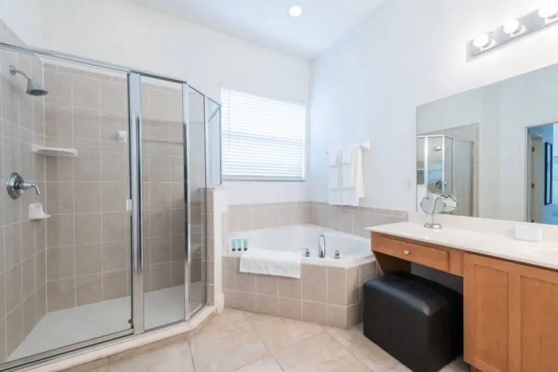 Reunion Resort villa 65 inch TV area Reunion Resort villa ensuite bathroom