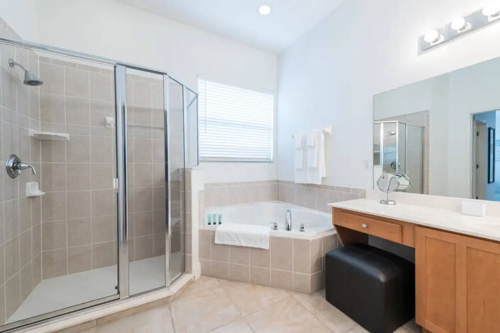 Reunion Resort villa 65 inch TV area Reunion Resort villa ensuite bathroom